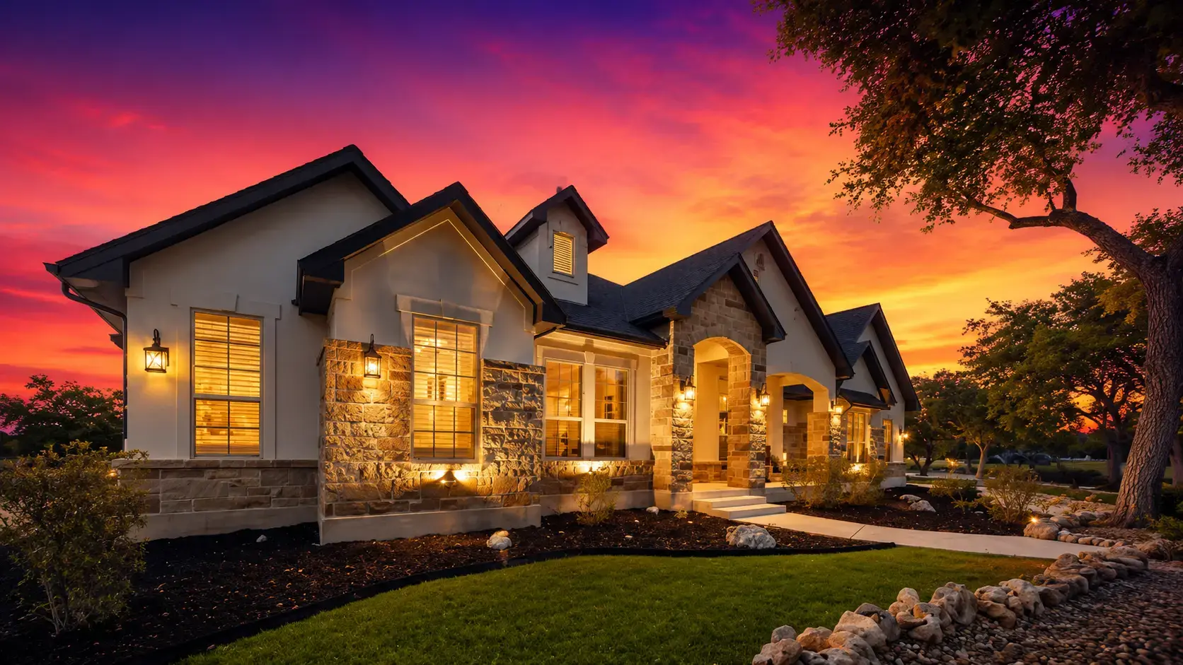 A home with a new roof under a vivid sunset sky